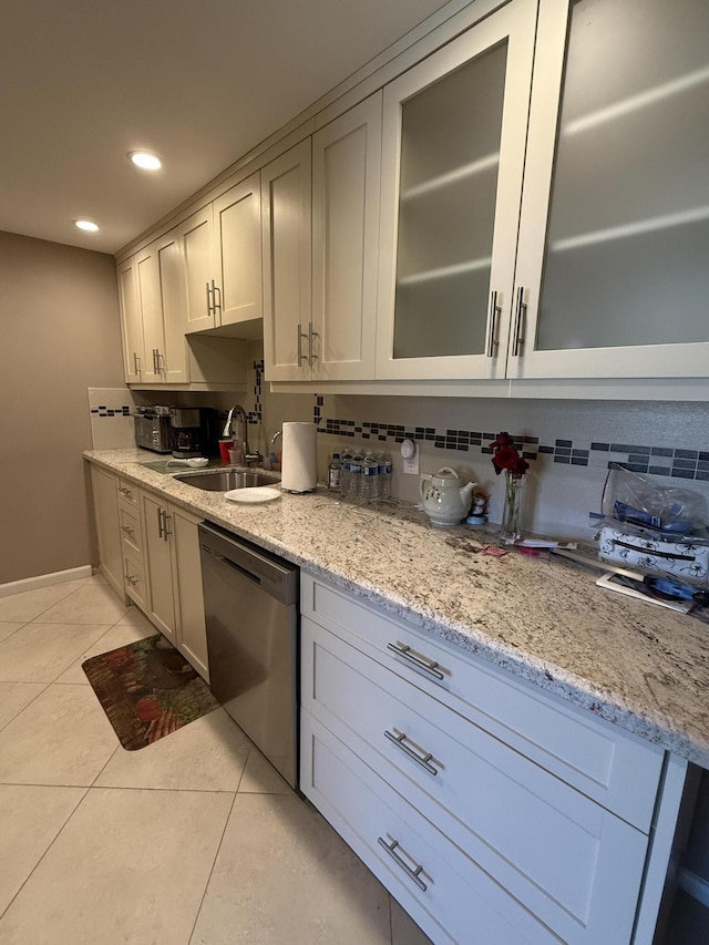 1008 Wolverton A, Boca Raton, FL 33434 - kitchen featuring dishwasher, light tile patterned floors, light stone counters, tasteful backsplash, and recessed lighting