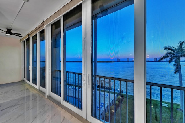 100 Paradise Harbour Blvd Unit 502, North Palm Beach, FL 33408 - balcony with a water view and a ceiling fan