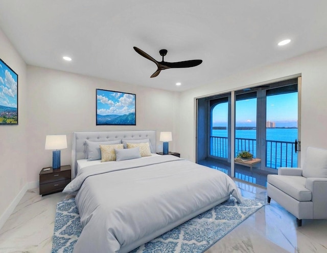 100 Paradise Harbour Blvd Unit 502, North Palm Beach, FL 33408 - bedroom with light marble finish floors, access to exterior, a water view, recessed lighting, and baseboards
