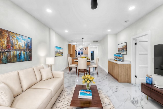100 Paradise Harbour Blvd Unit 502, North Palm Beach, FL 33408 - living room featuring recessed lighting and light marble finish floors