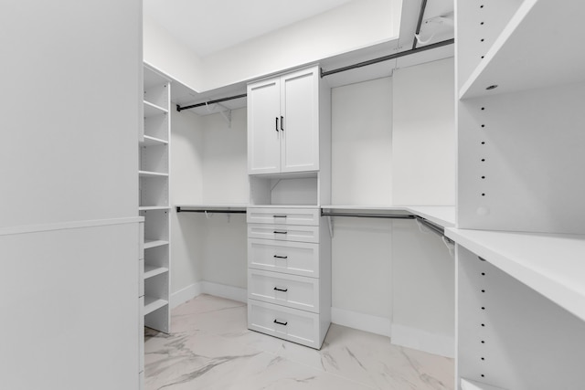 100 Paradise Harbour Blvd Unit 502, North Palm Beach, FL 33408 - spacious closet featuring light marble finish flooring