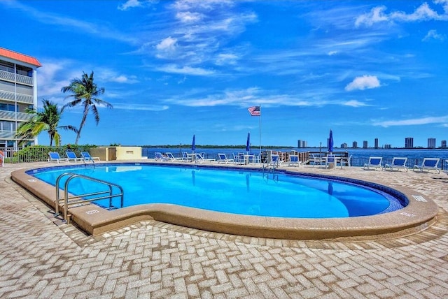 100 Paradise Harbour Blvd Unit 502, North Palm Beach, FL 33408 - community pool with a patio