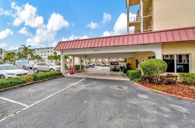 100 Paradise Harbour Blvd Unit 502, North Palm Beach, FL 33408 - view of partially covered parking lot