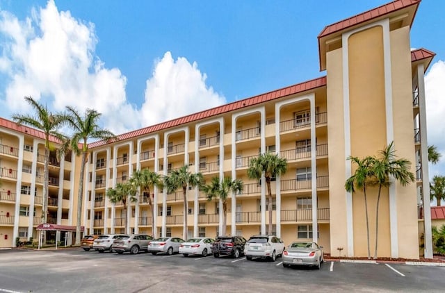 100 Paradise Harbour Blvd Unit 502, North Palm Beach, FL 33408 - view of apartment building / complex with uncovered parking