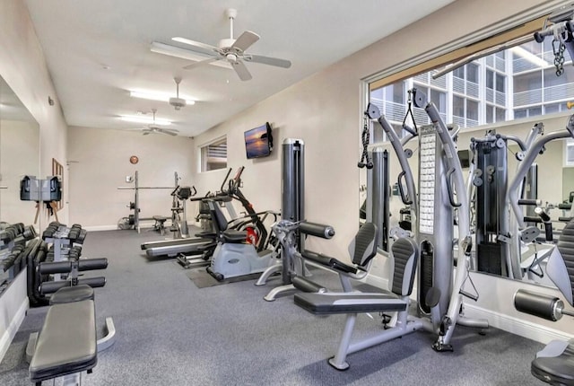 100 Paradise Harbour Blvd Unit 502, North Palm Beach, FL 33408 - workout area featuring ceiling fan and baseboards