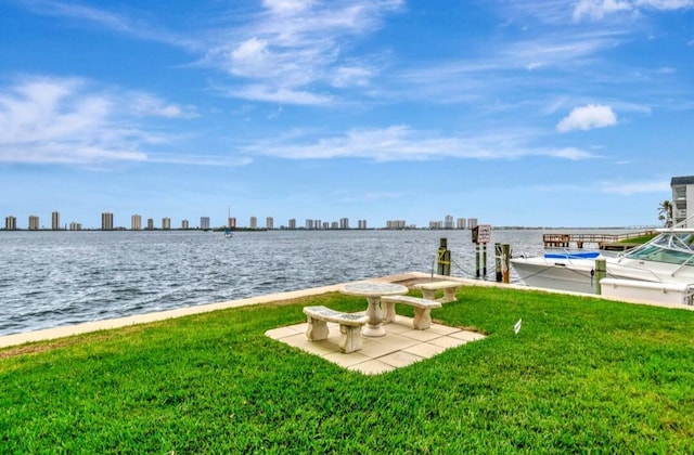 100 Paradise Harbour Blvd Unit 502, North Palm Beach, FL 33408 - water view featuring skyline and a dock