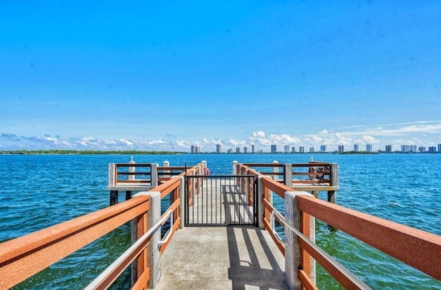 100 Paradise Harbour Blvd Unit 502, North Palm Beach, FL 33408 - dock with a water view and a view of city