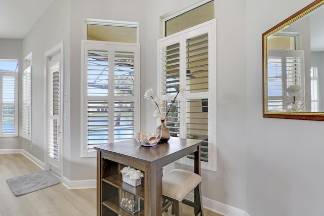 17009 SW Sapri Way, Port Saint Lucie, FL 34986 - dining area view of wood finished floors and baseboards