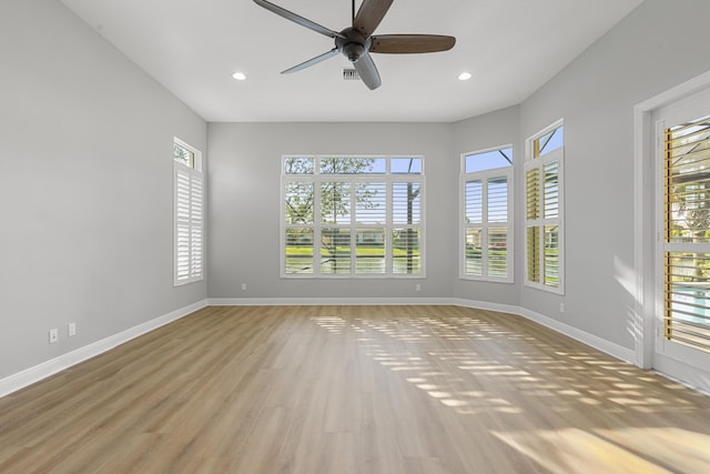 17009 SW Sapri Way, Port Saint Lucie, FL 34986 - spare room featuring baseboards, a ceiling fan, light wood-style flooring, and recessed lighting