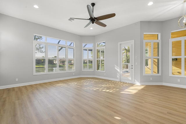 17009 SW Sapri Way, Port Saint Lucie, FL 34986 - unfurnished room featuring light wood-style flooring, recessed lighting, a ceiling fan, and baseboards