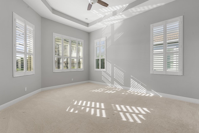 17009 SW Sapri Way, Port Saint Lucie, FL 34986 - spare room featuring carpet floors, ceiling fan, and baseboards