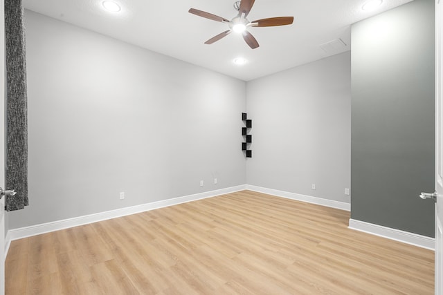 17009 SW Sapri Way, Port Saint Lucie, FL 34986 - empty room featuring a ceiling fan, light wood finished floors, baseboards, and recessed lighting