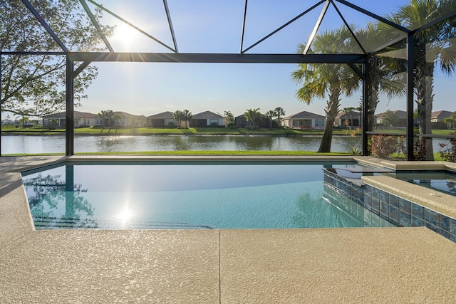 17009 SW Sapri Way, Port Saint Lucie, FL 34986 - view of swimming pool with a water view, glass enclosure, and a residential view