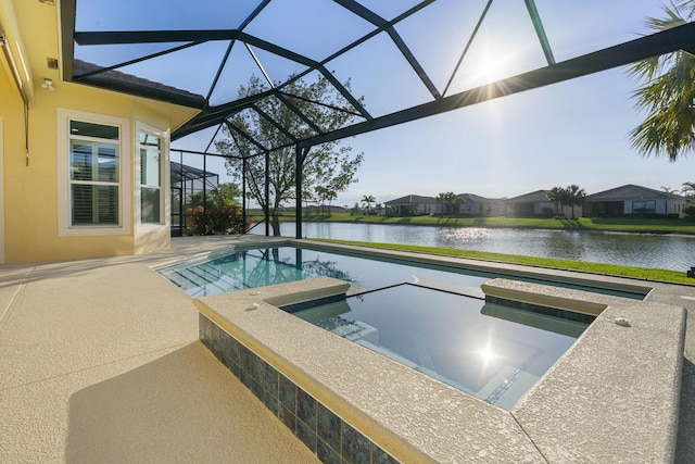17009 SW Sapri Way, Port Saint Lucie, FL 34986 - outdoor pool featuring an in-ground hot tub, a water view, a patio, and a lanai