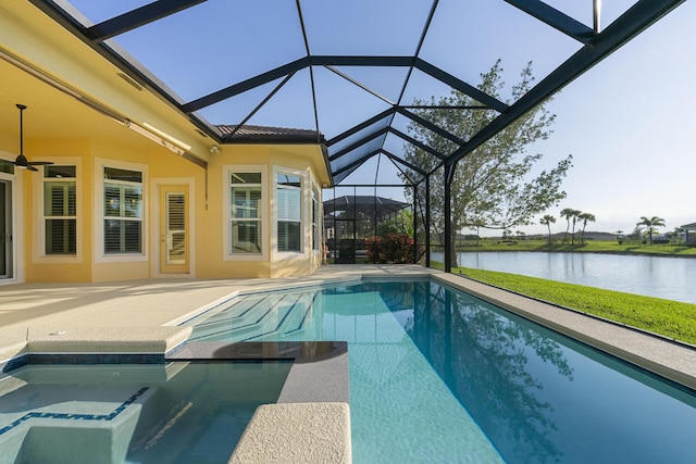 17009 SW Sapri Way, Port Saint Lucie, FL 34986 - view of swimming pool with a water view, a patio, glass enclosure, and ceiling fan