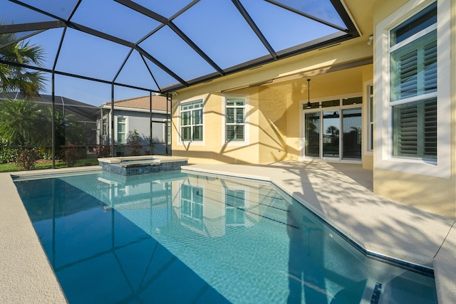 17009 SW Sapri Way, Port Saint Lucie, FL 34986 - view of pool with a patio area, a pool with connected hot tub, and a lanai