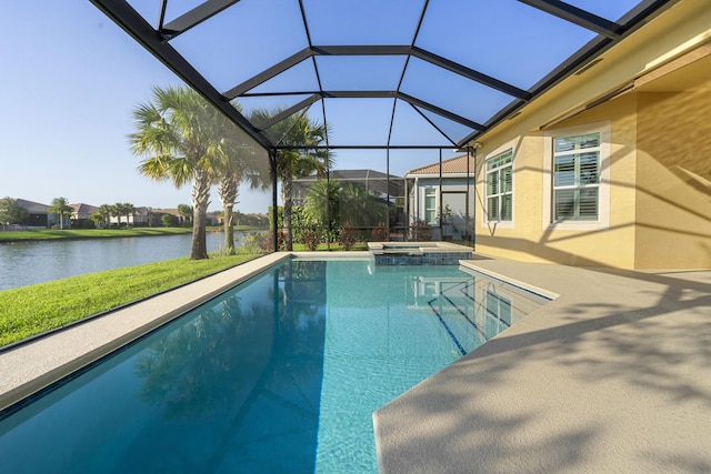 17009 SW Sapri Way, Port Saint Lucie, FL 34986 - view of swimming pool featuring a water view, a pool with connected hot tub, a patio area, and a lanai