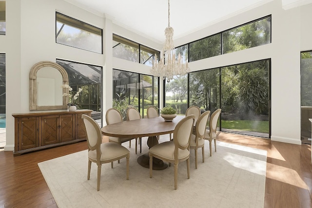 17902 Milburn Way, Boca Raton, FL 33498 - sunroom / solarium featuring a chandelier