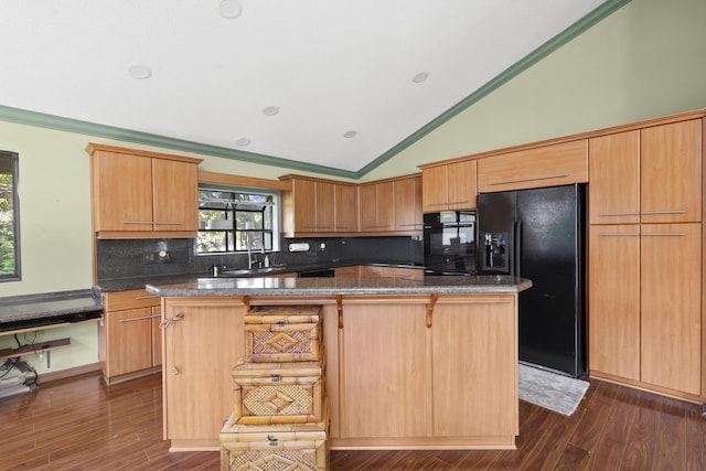17902 Milburn Way, Boca Raton, FL 33498 - kitchen featuring black appliances, a kitchen island, backsplash, lofted ceiling, and a breakfast bar area