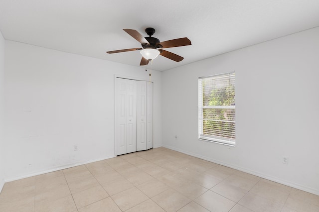 1042 SW Janette Ave, Port Saint Lucie, FL 34953 - unfurnished bedroom featuring a closet and ceiling fan