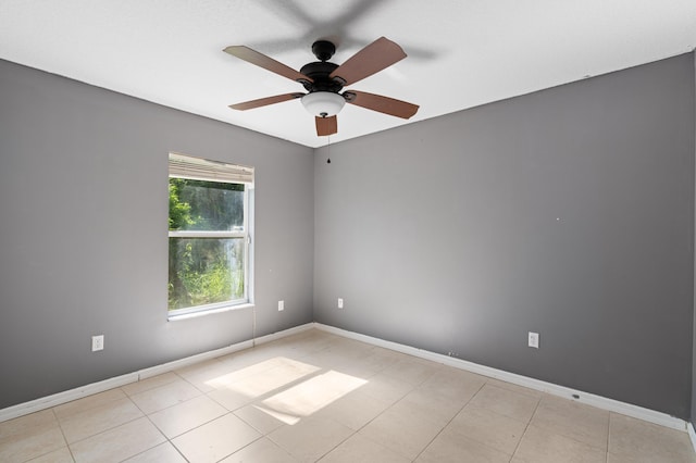 1042 SW Janette Ave, Port Saint Lucie, FL 34953 - spare room with ceiling fan and light tile patterned floors