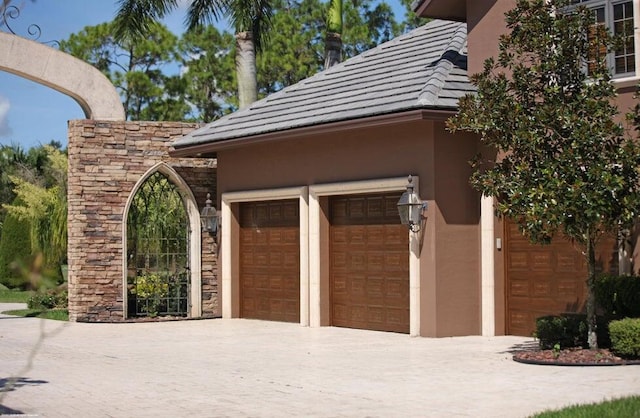 garage with driveway