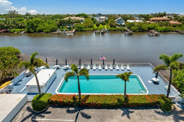 4001 S Ocean Blvd Unit 118, South Palm Beach, FL 33480 - community pool with a water view and fence