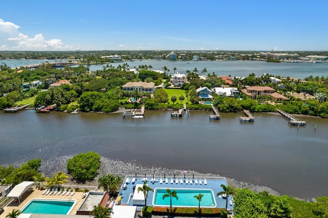 4001 S Ocean Blvd Unit 118, South Palm Beach, FL 33480 - drone / aerial view of a pool area and a nearby body of water