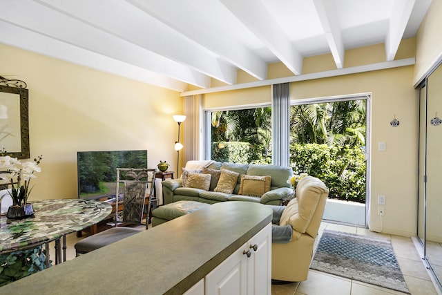 4001 S Ocean Blvd Unit 118, South Palm Beach, FL 33480 - living area with beamed ceiling and light tile patterned flooring