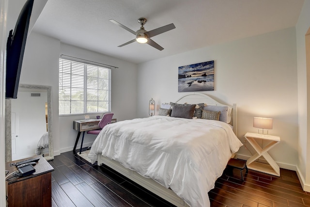 255 NE 3rd Ave Unit 2-516, Delray Beach, FL 33444 - bedroom with dark wood-type flooring, baseboards, and a ceiling fan
