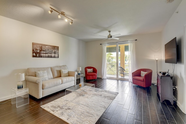 255 NE 3rd Ave Unit 2-516, Delray Beach, FL 33444 - living room with dark wood-style flooring, ceiling fan, and baseboards