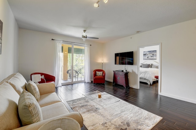 255 NE 3rd Ave Unit 2-516, Delray Beach, FL 33444 - living area with dark wood-type flooring, baseboards, and a ceiling fan