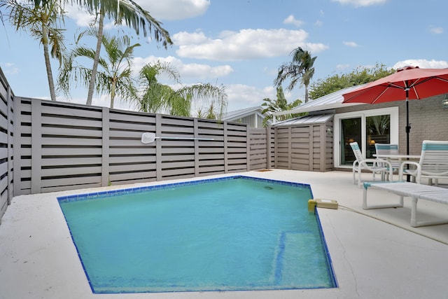1801 S US Highway 1 Unit 7C, Jupiter, FL 33477 - view of swimming pool with a patio area