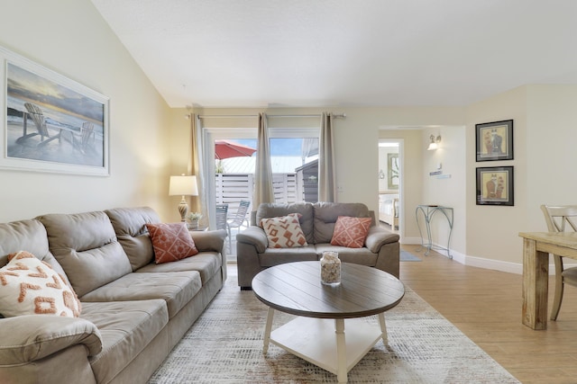 1801 S US Highway 1 Unit 7C, Jupiter, FL 33477 - living area featuring light wood finished floors and baseboards