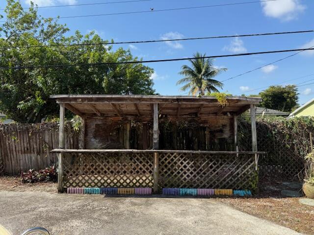 view of patio / terrace featuring fence