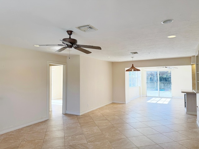 unfurnished room featuring a ceiling fan, baseboards, recessed lighting, and light tile patterned floors