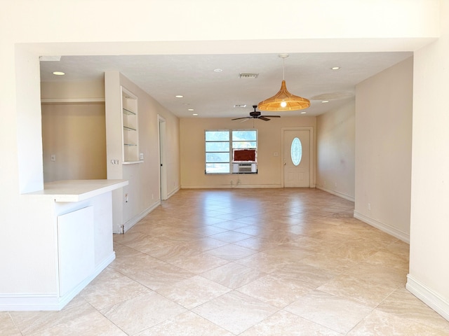 unfurnished room with ceiling fan, baseboards, recessed lighting, cooling unit, and light tile patterned floors