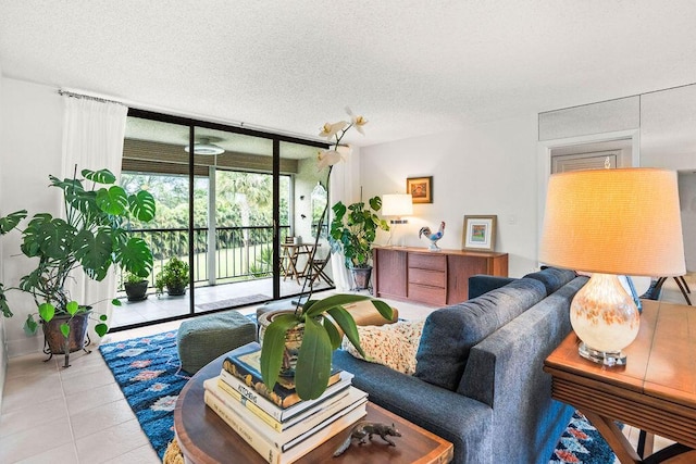 2520 Presidential Way Unit 203, West Palm Beach, FL 33401 - tiled living area with a textured ceiling