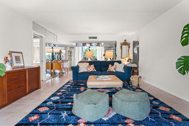 2520 Presidential Way Unit 203, West Palm Beach, FL 33401 - living area featuring light tile patterned floors