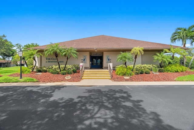 1 Danby Pl, Boynton Beach, FL 33426 - view of front facade featuring french doors and stucco siding