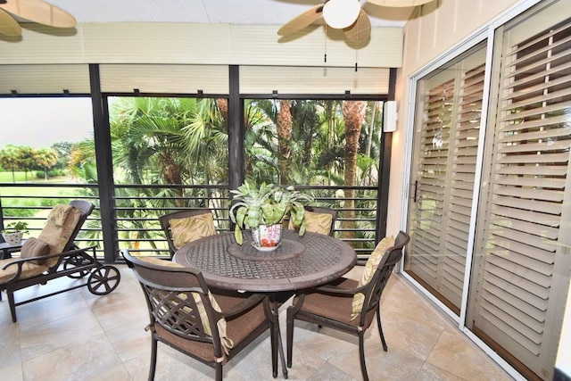 5845 NW 24th Ave Unit 1103, Boca Raton, FL 33496 - sunroom with ceiling fan and outdoor dining space