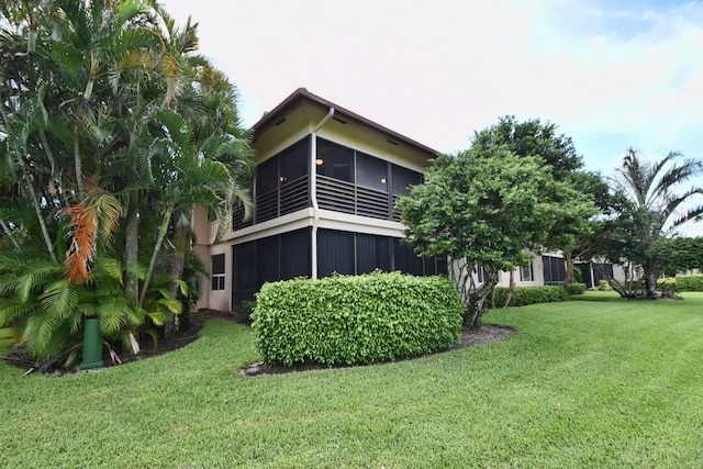 5845 NW 24th Ave Unit 1103, Boca Raton, FL 33496 - view of home's exterior featuring a lawn