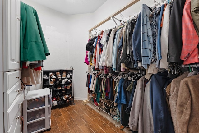 spacious closet featuring wood finished floors
