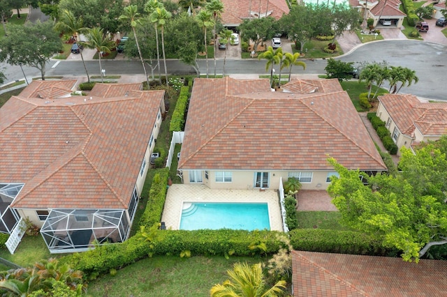 aerial perspective of suburban area with a pool