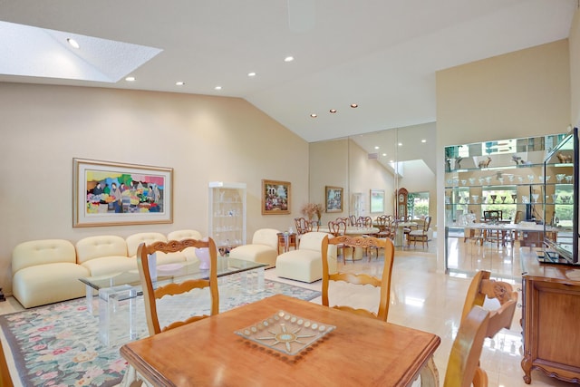 4721 Fountains Dr S, Lake Worth, FL 33467 - dining space with high vaulted ceiling, recessed lighting, a skylight, and tile patterned flooring