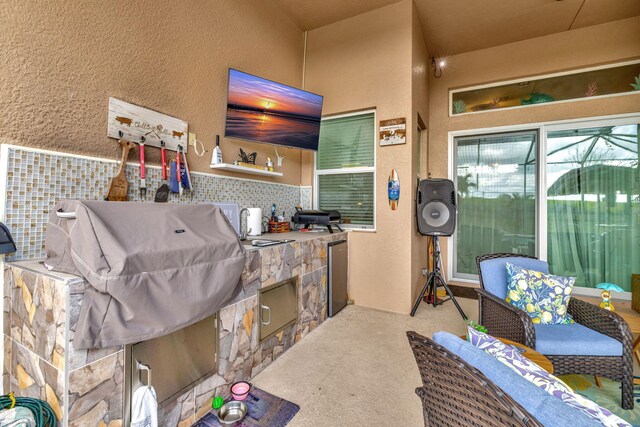 341 SW Kestor Dr, Port Saint Lucie, FL 34953 - view of patio / terrace featuring exterior kitchen