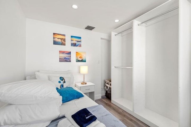 921 SE 13th Ct, Deerfield Beach, FL 33441 - bedroom with light wood-style flooring and recessed lighting