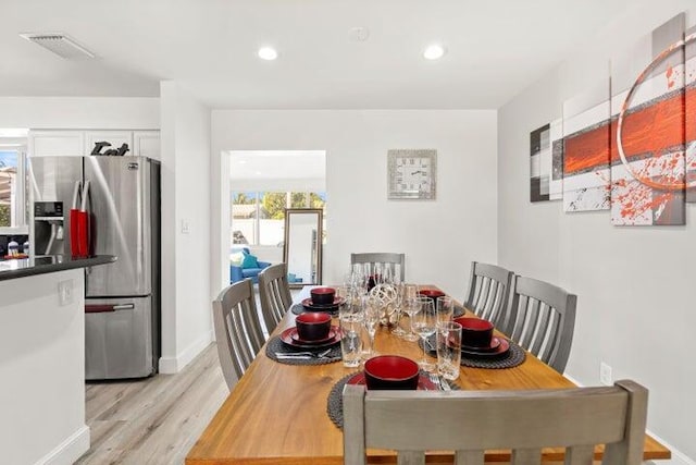 921 SE 13th Ct, Deerfield Beach, FL 33441 - dining room with light wood-style flooring, baseboards, and recessed lighting