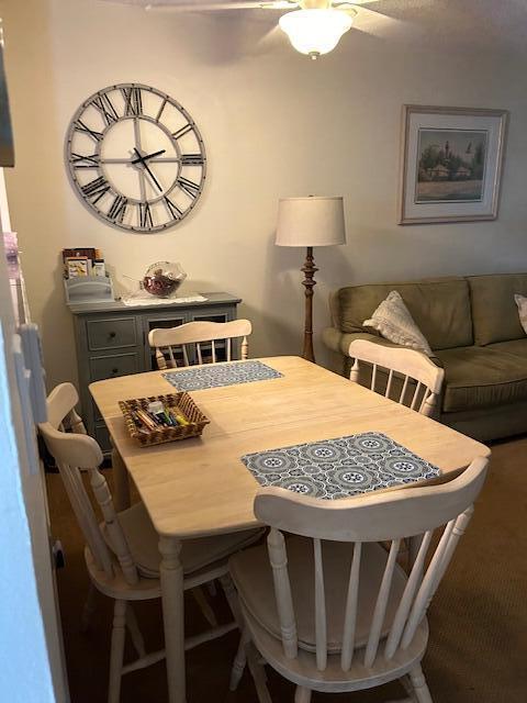 2724 S Garden Dr Unit 311, Lake Worth, FL 33461 - carpeted dining room featuring ceiling fan