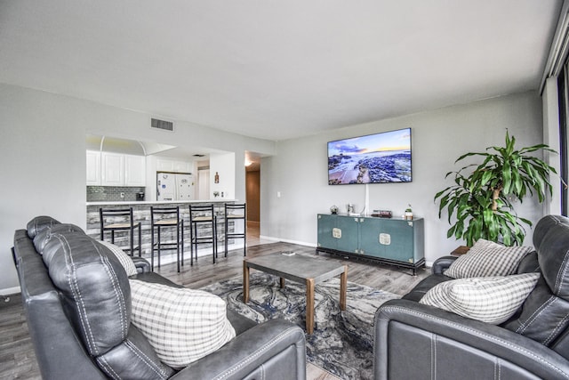 799 Jeffery St Unit 101, Boca Raton, FL 33487 - living room with wood finished floors and baseboards